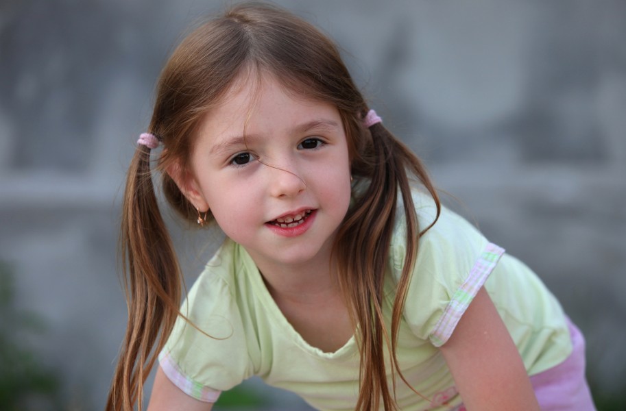 a cute brunette child girl in a Christian camp in July 2013, portrait 4/7