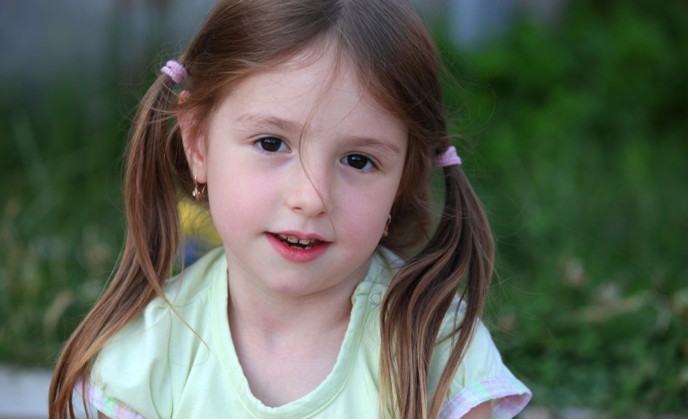 a cute brunette child girl in a Christian camp in July 2013, portrait 5/7
