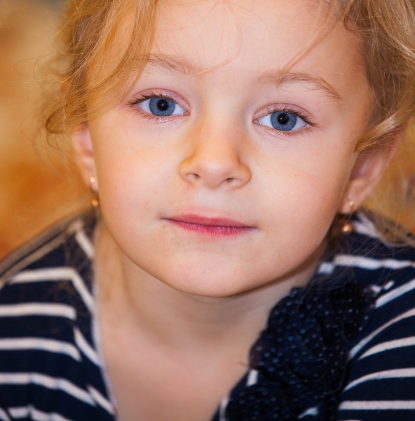 a cute child girl photographed in December 2013, picture 2/2