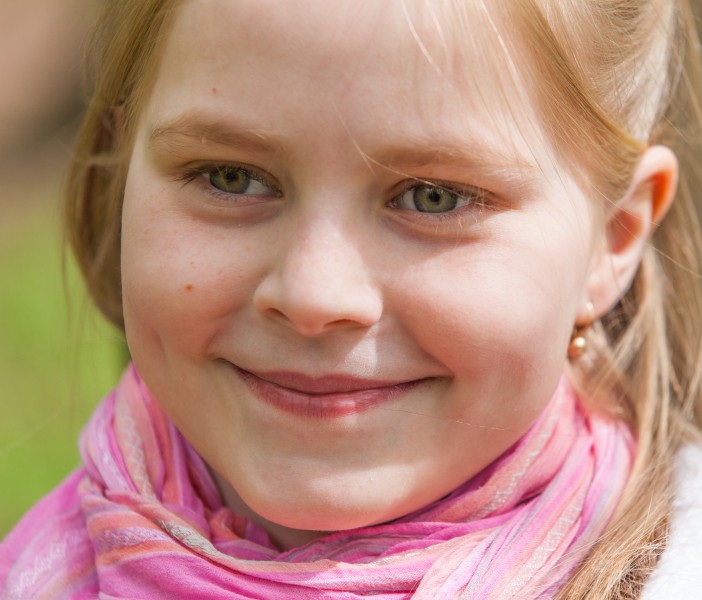 a cute Roman-Catholic blond child girl photographed in April 2014, portrait 6/29