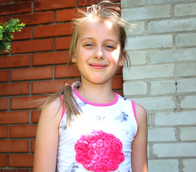 a cute young blond Catholic girl photographed in May 2013, portrait 4/7