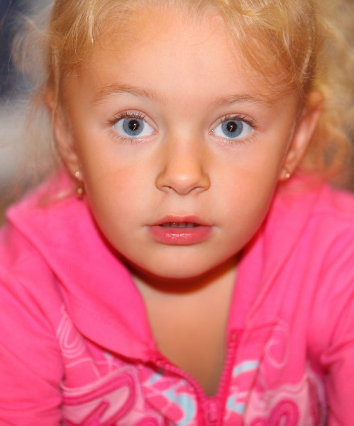 a sweet blond child girl photographed in September 2013, picture 4/4