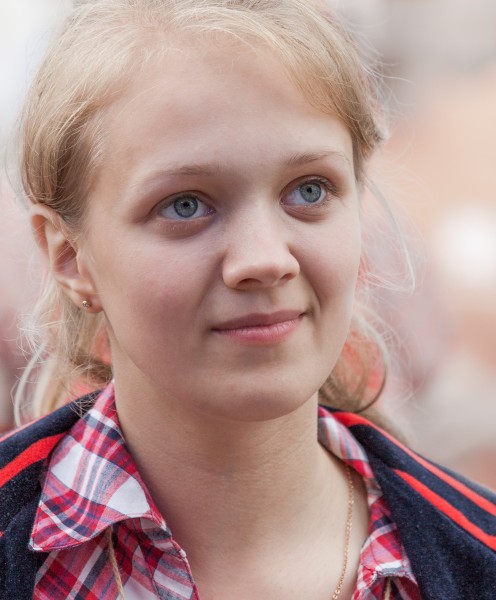 a young cute blond girl photographed in July 2014, picture 5