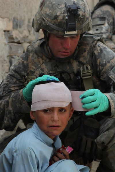 Afghan child's head wound treated...