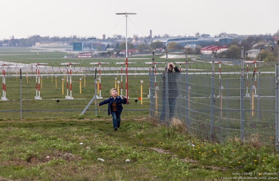 boys near an airport in April 2019 photographed by Serhiy Lvivsky