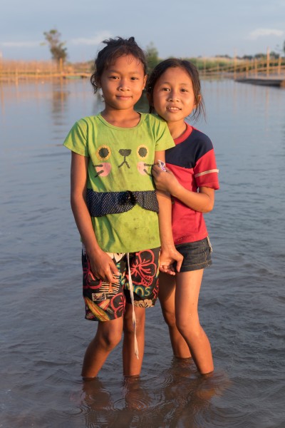 Portrait of two girls feet in the Mekong