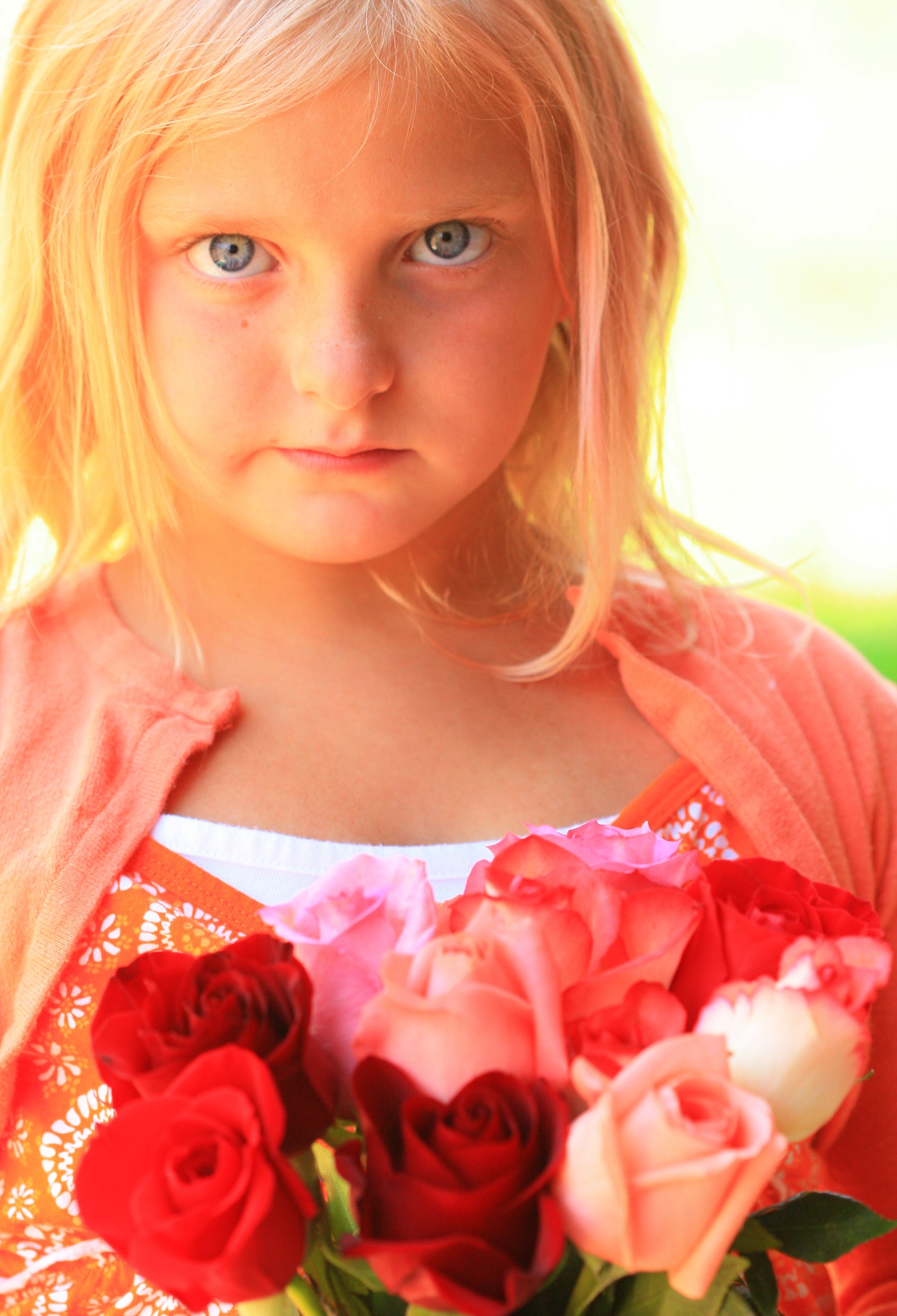 Sweet Little Girl with Roses