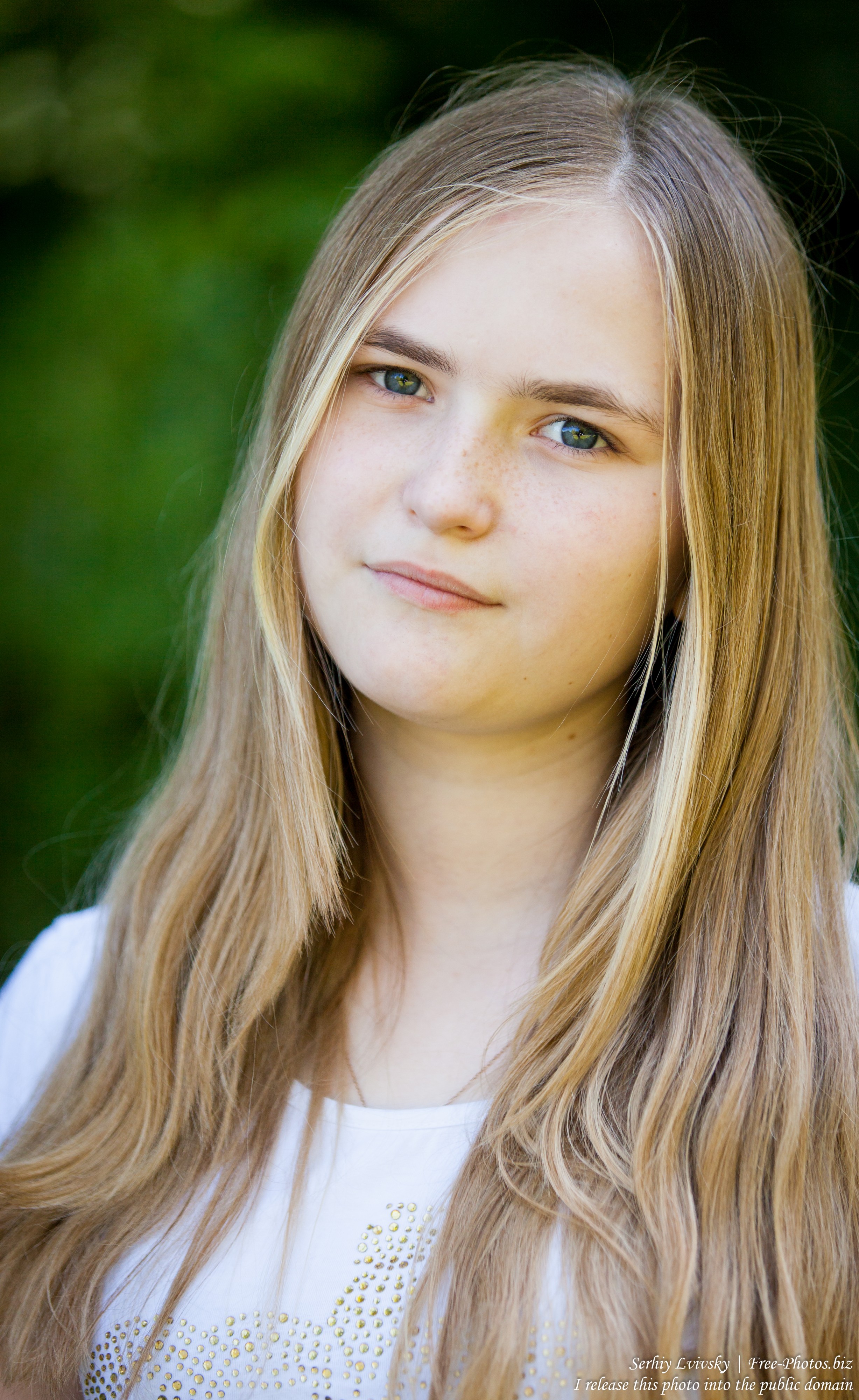 a 14-year old fair-haired girl photographed in June 2015, picture 6