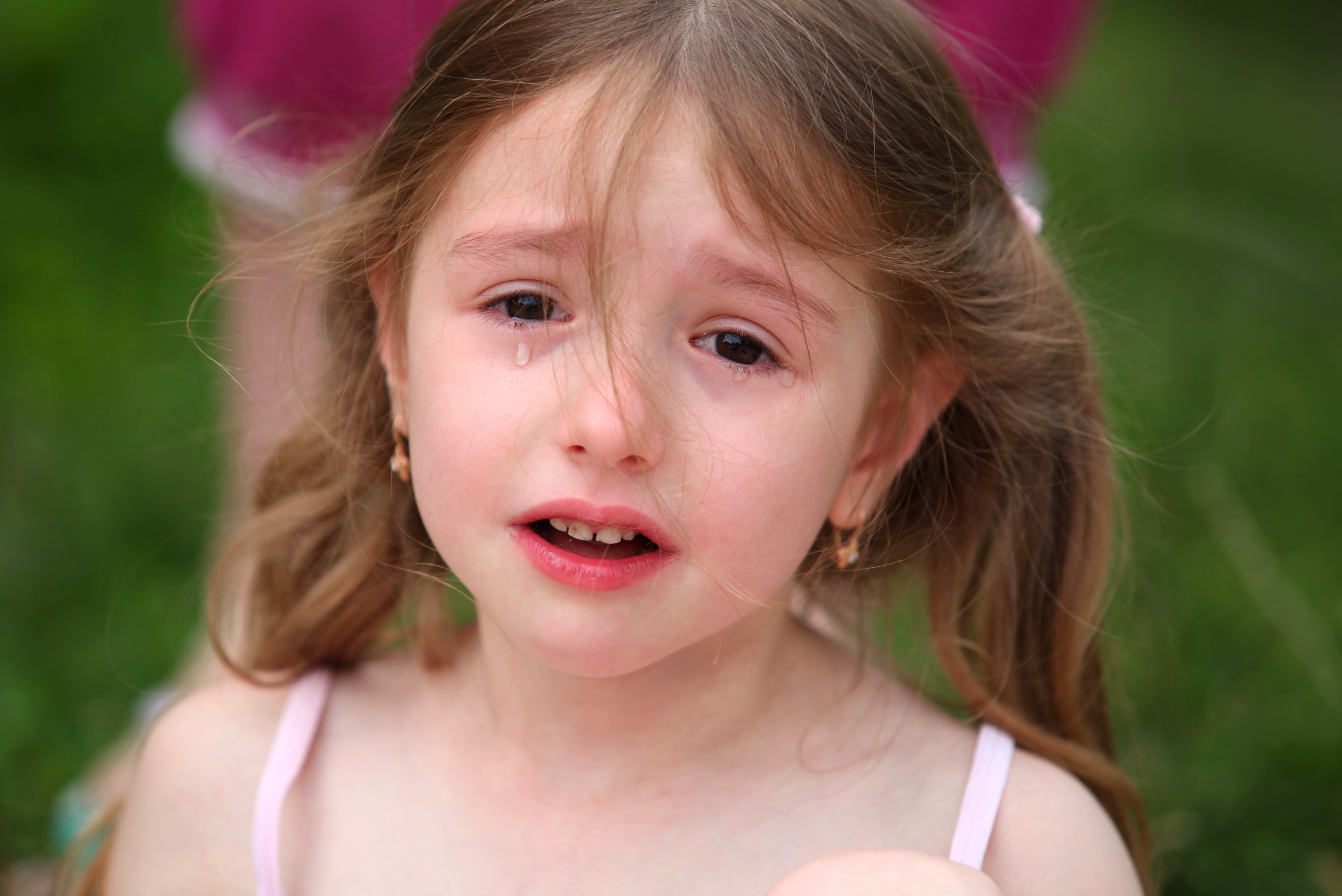 a cute brunette child girl crying, July 2013