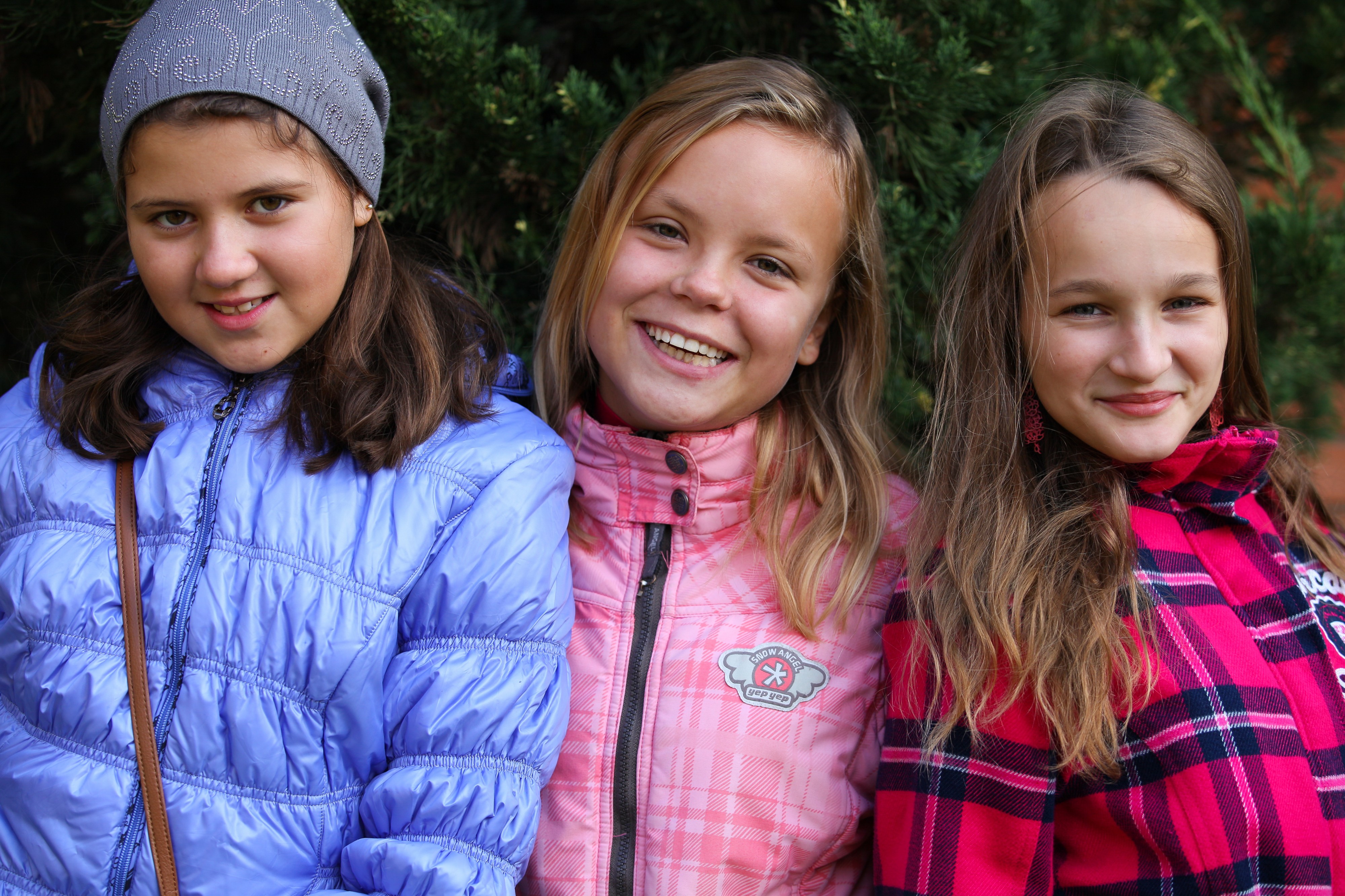 three schoolgirls-friends, photographed in September 2013, picture 1/3