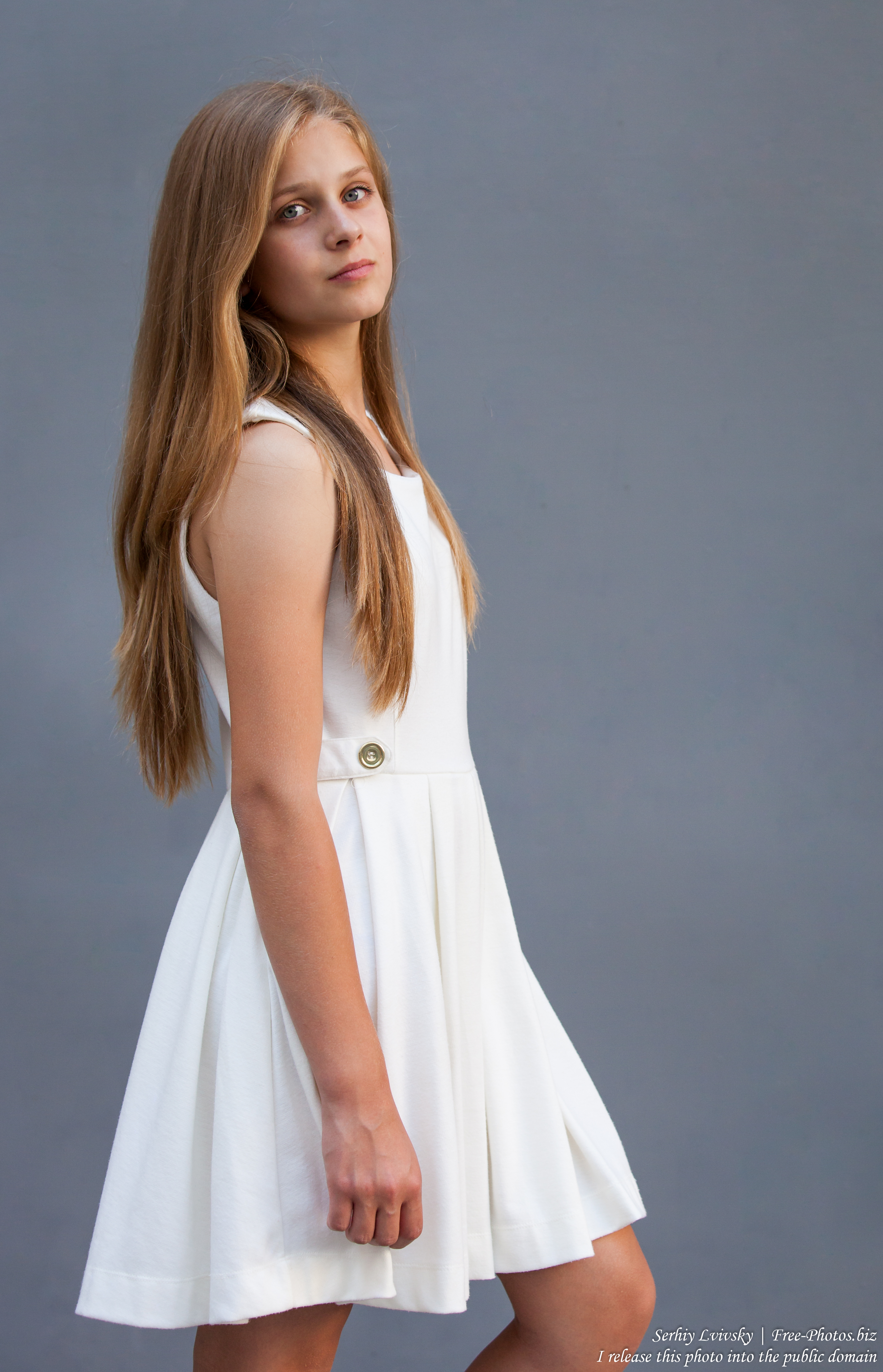 a 12-year-old blond girl wearing a white dress photographed in July 2015 by Serhiy Lvivsky, picture 11