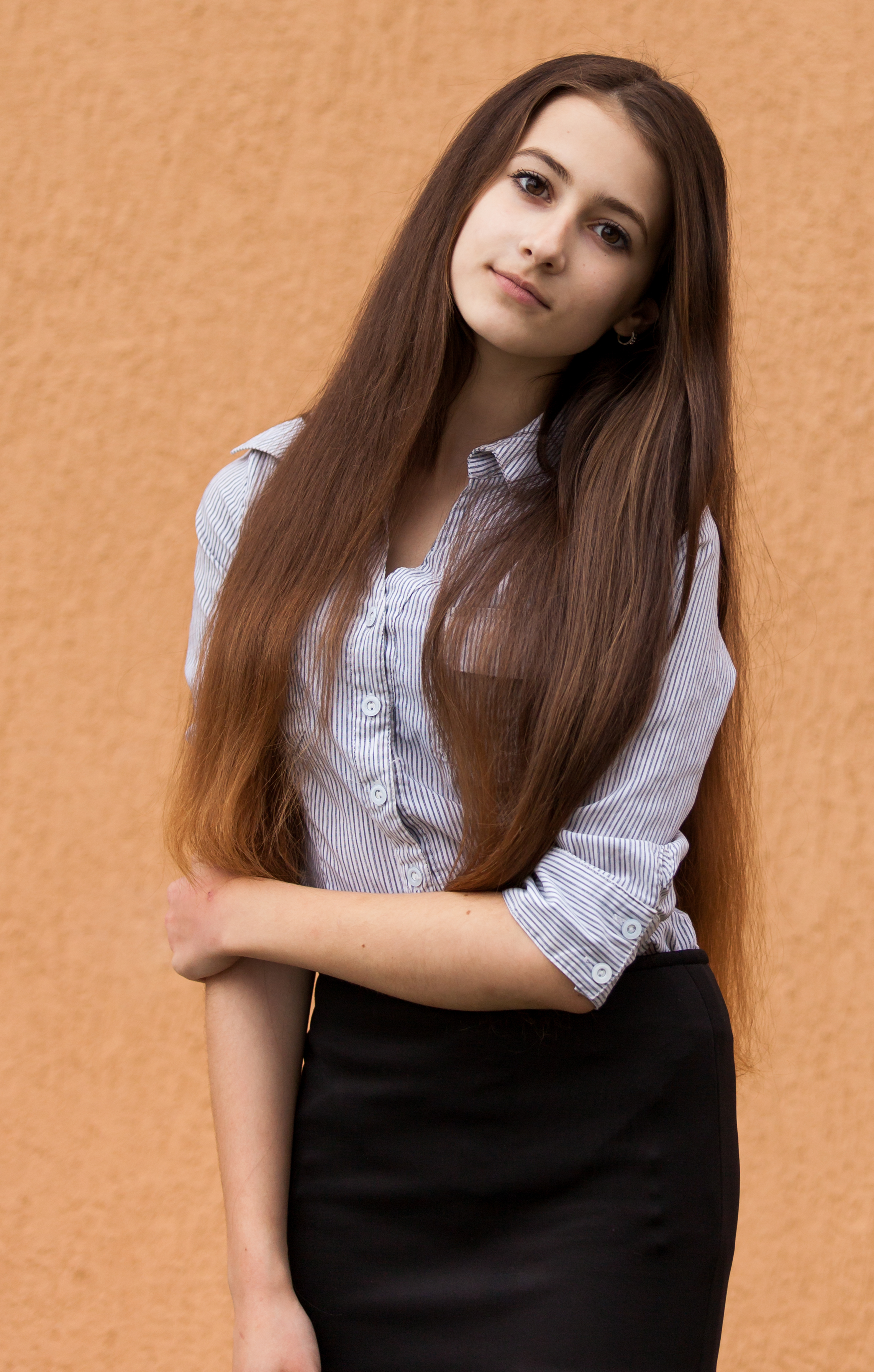 a 13-year-old brunette girl photographed in May 2015, picture 1