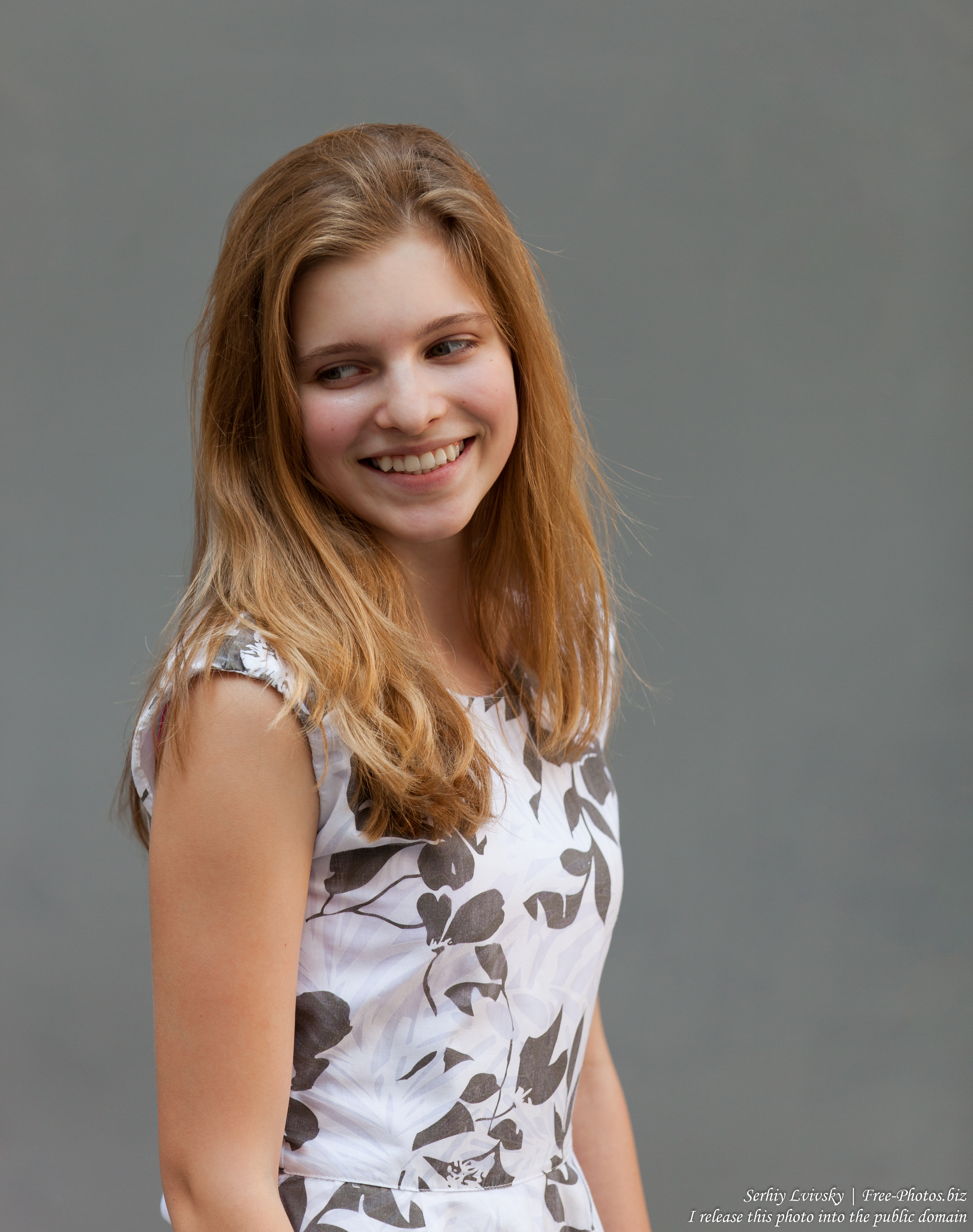 a 14-year-old blond Roman-Catholic girl photographed in July 2015, picture 1