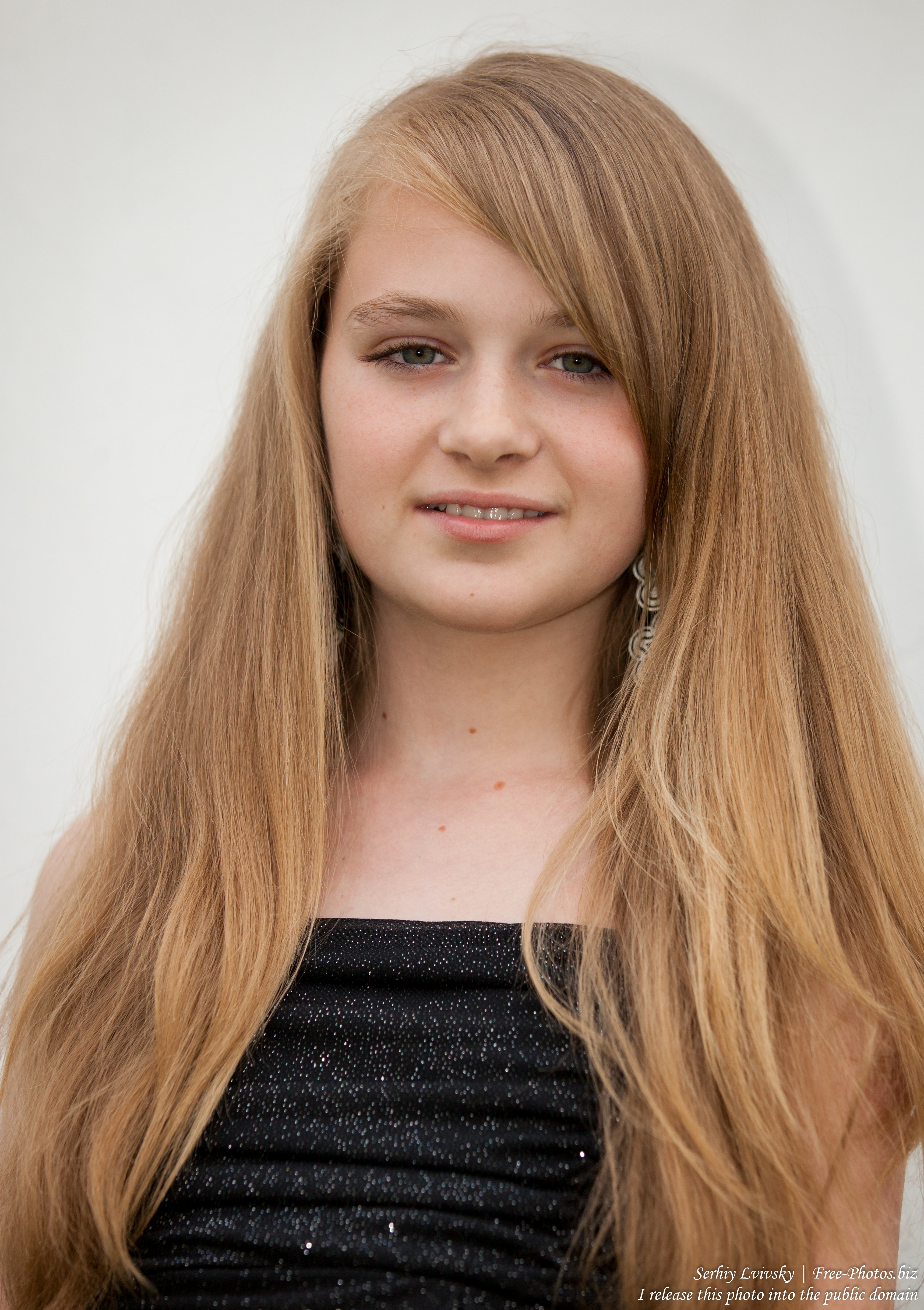 a blond 13-year-old girl photographed in June 2015, picture 9