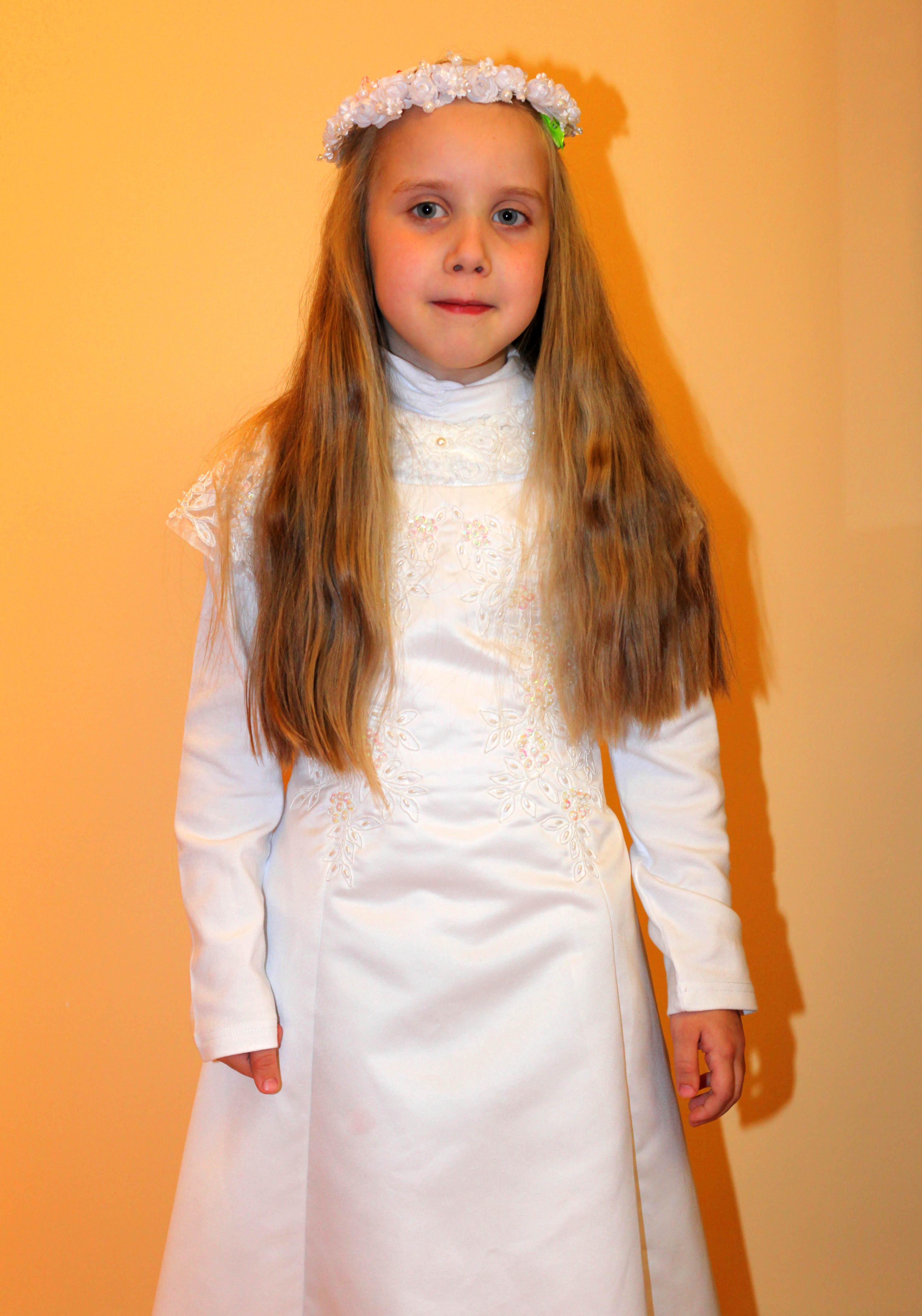 a Catholic girl preparing to her first Holy Communion in May 2013