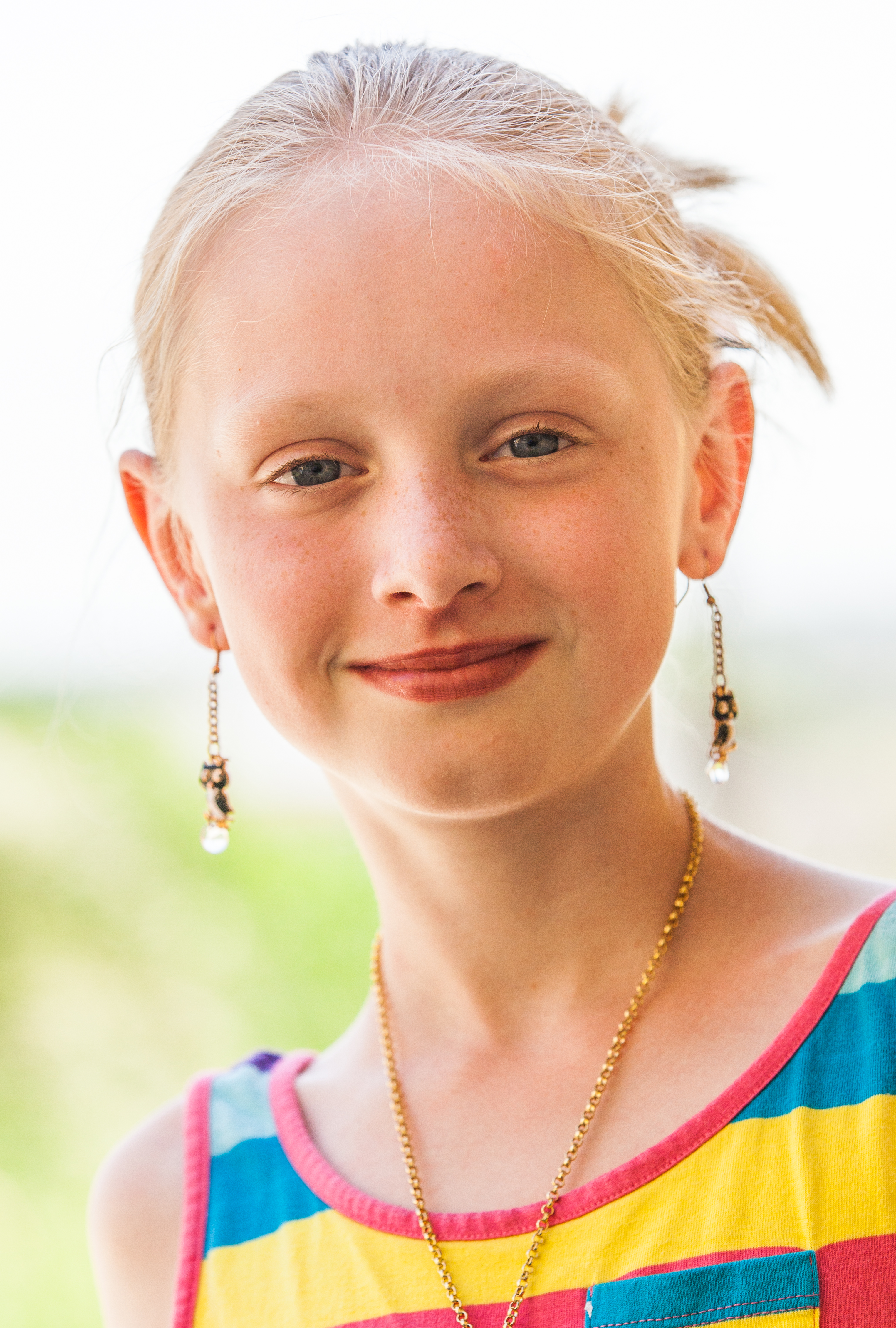 a cute young blond Catholic girl photographed in May 2014, portrait 5/12
