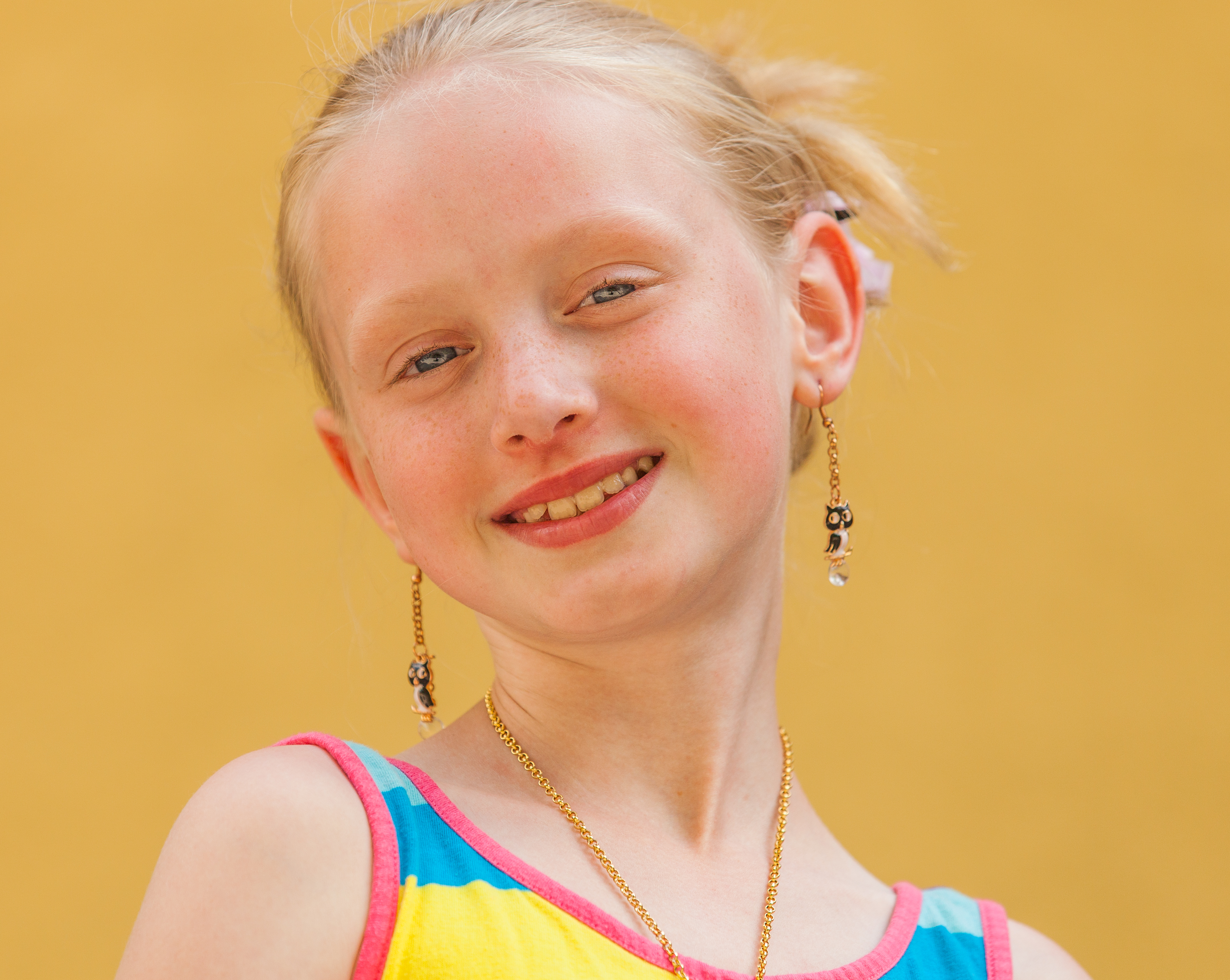 a cute young blond Catholic girl photographed in May 2014, portrait 9/12
