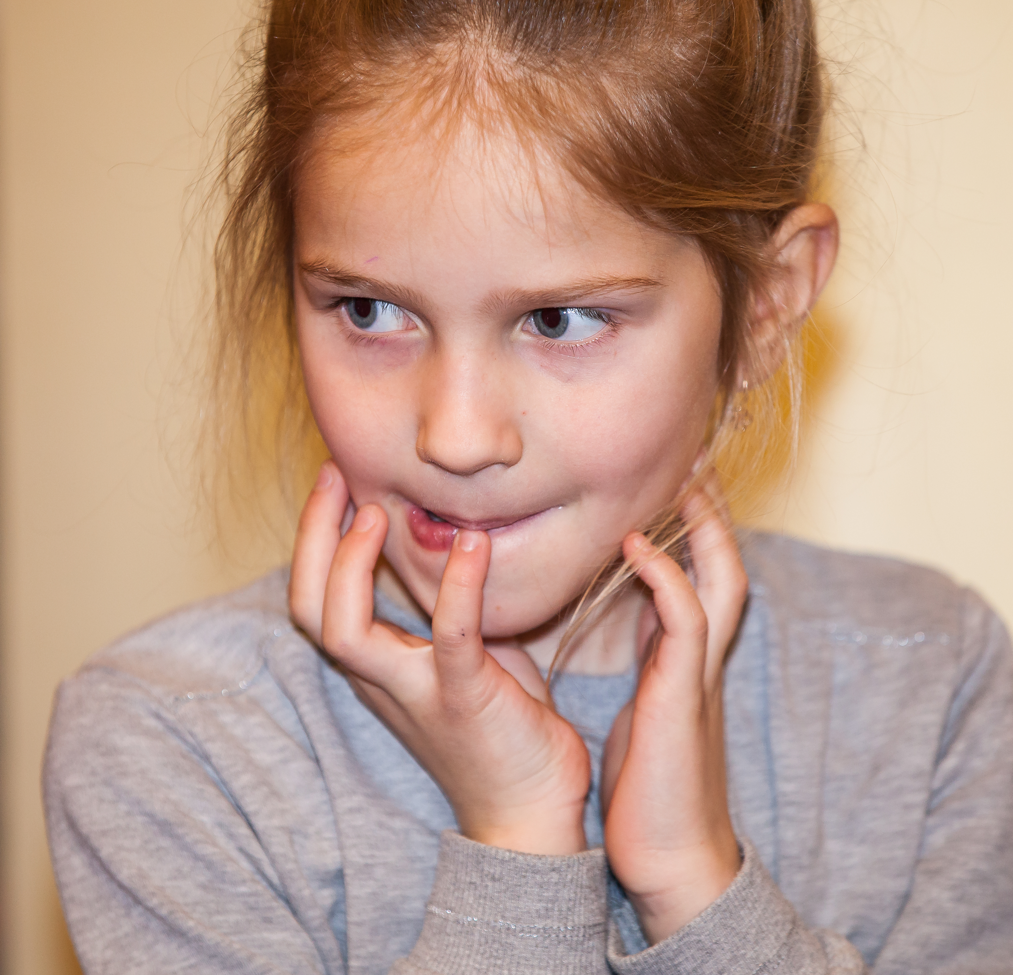 a young girl with an interesting face expression, photographed in December 2013