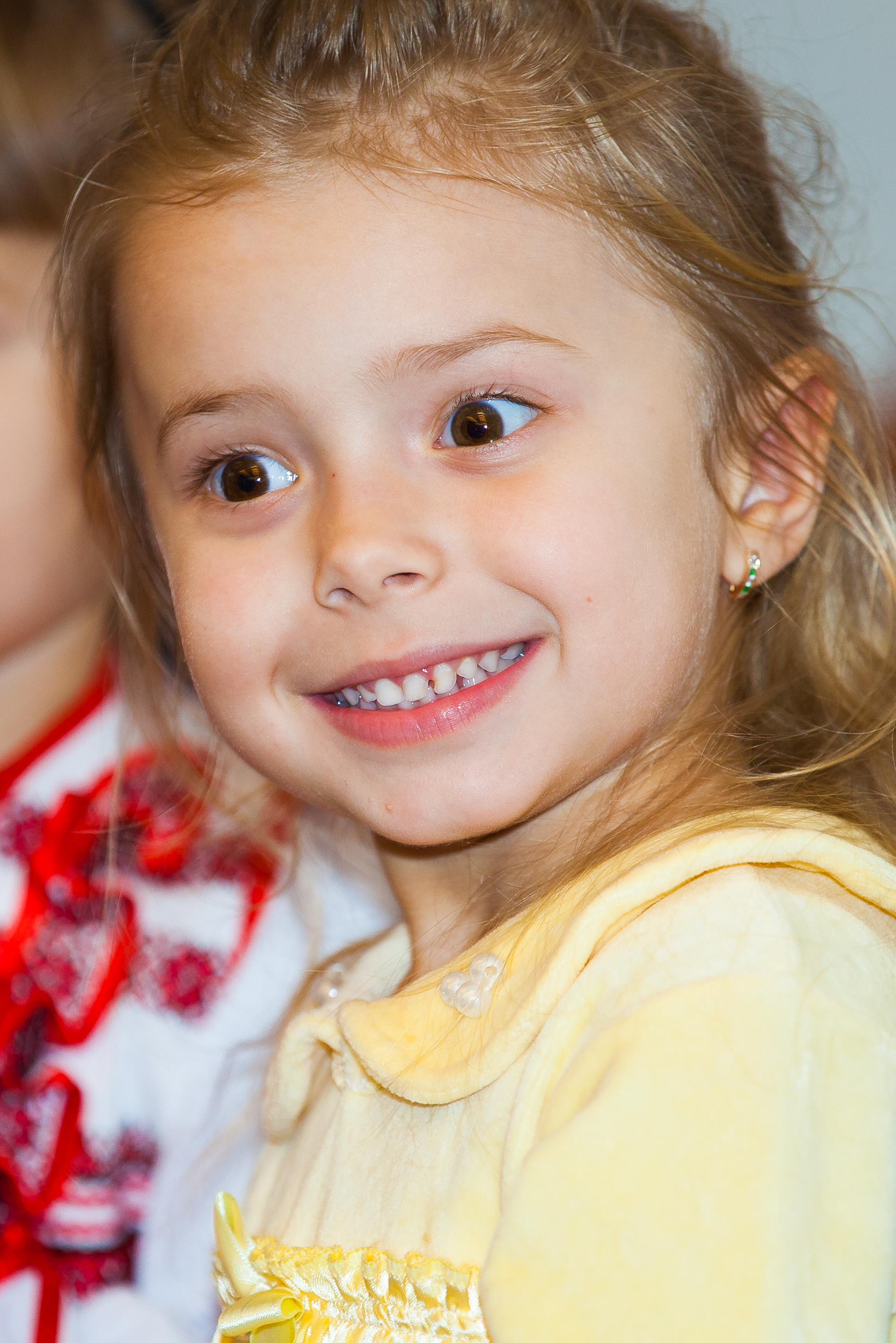 an amazing blond child girl in a Catholic kindergarten photographed in November 2013, picture 1