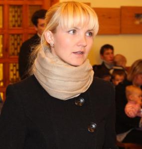 an amazingly tender and charming beautiful young blond Catholic woman in a Church, photo 5