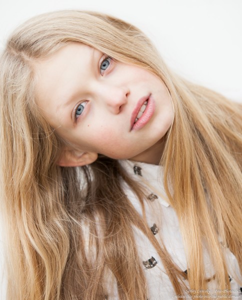 a 12-year-old natural blond Catholic girl photographed by Serhiy Lvivsky in November 2015, picture 4