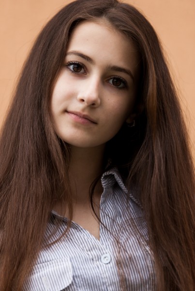 a 13-year-old brunette girl photographed in May 2015, picture 7