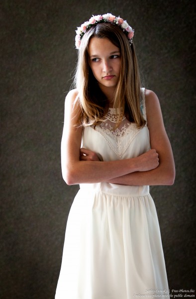 a 13-year-old Catholic girl in a white dress photographed in June 2015, picture 7