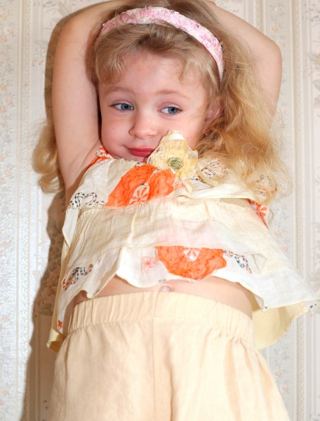 a beautiful child girl in a room, picture 18