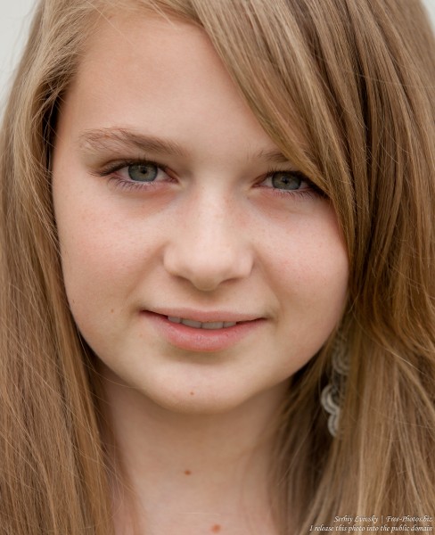 a blond 13-year-old girl photographed in June 2015, picture 1