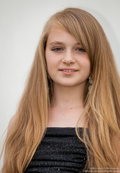 a blond 13-year-old girl photographed in June 2015, picture 8