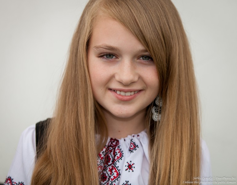 a blond 13-year-old girl photographed in June 2015, picture 20