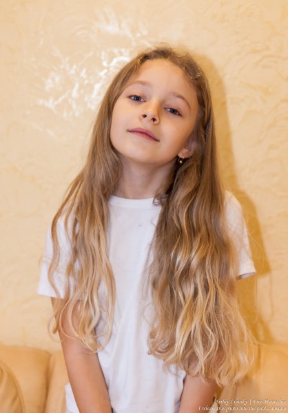 a cute blond child girl photographed in January 2017, picture 2
