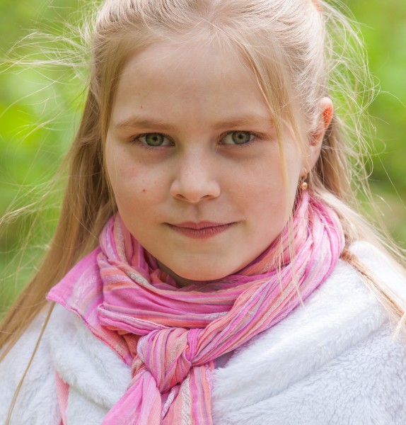 a cute Roman-Catholic blond child girl photographed in April 2014, portrait 3/29
