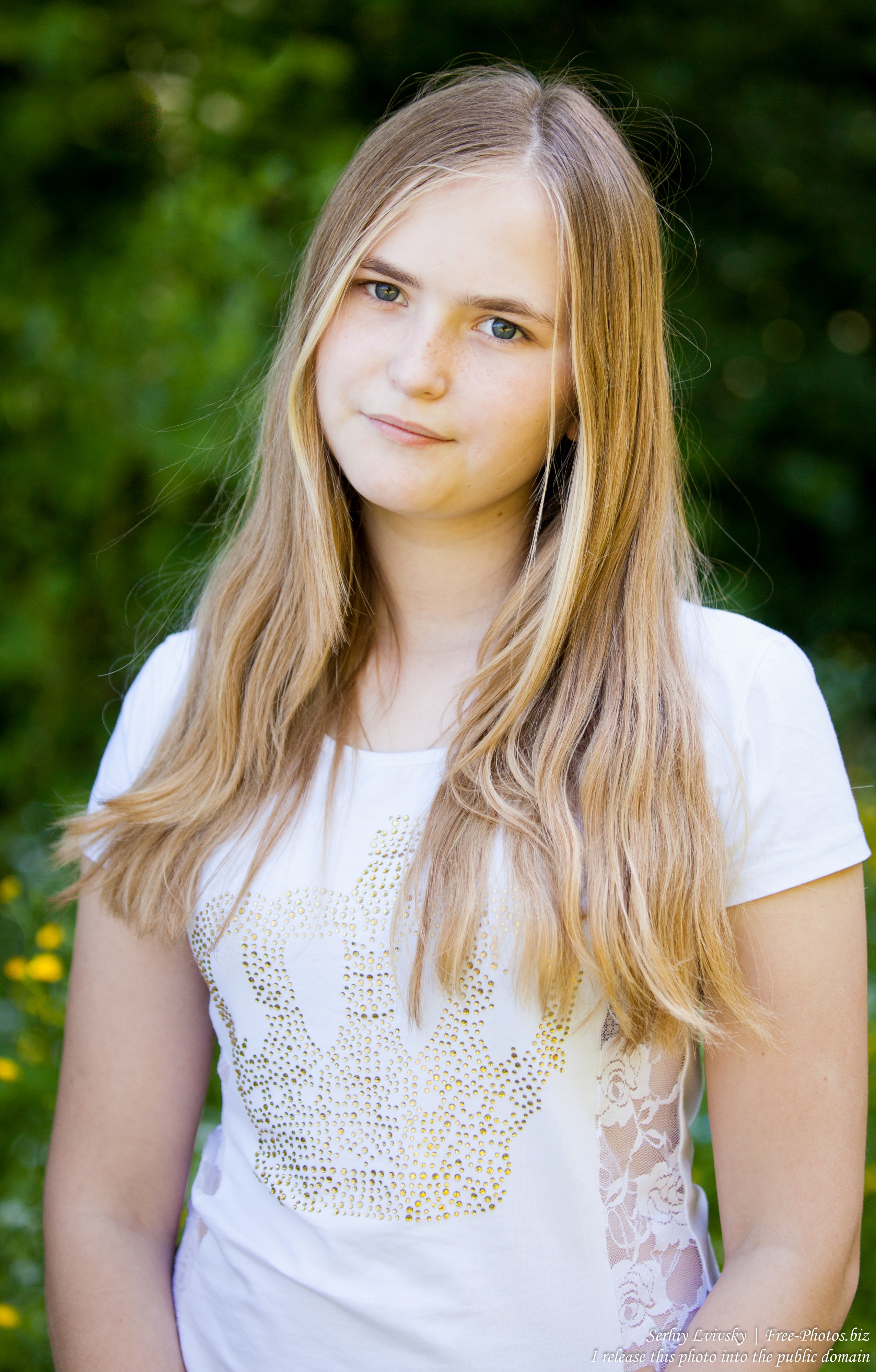 a 14-year old fair-haired girl photographed in June 2015, picture 4