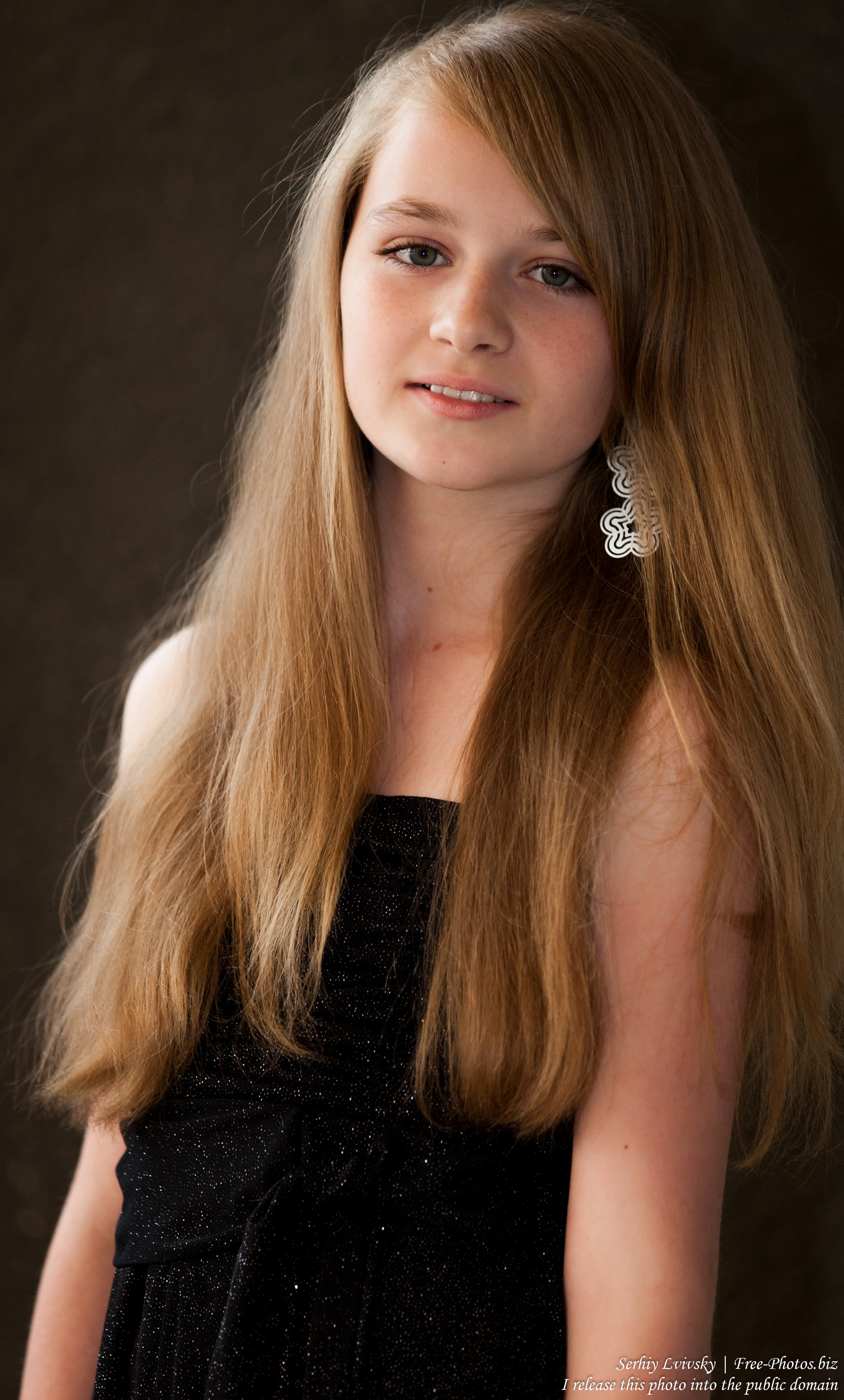 a blond 13-year-old girl photographed in June 2015, picture 3