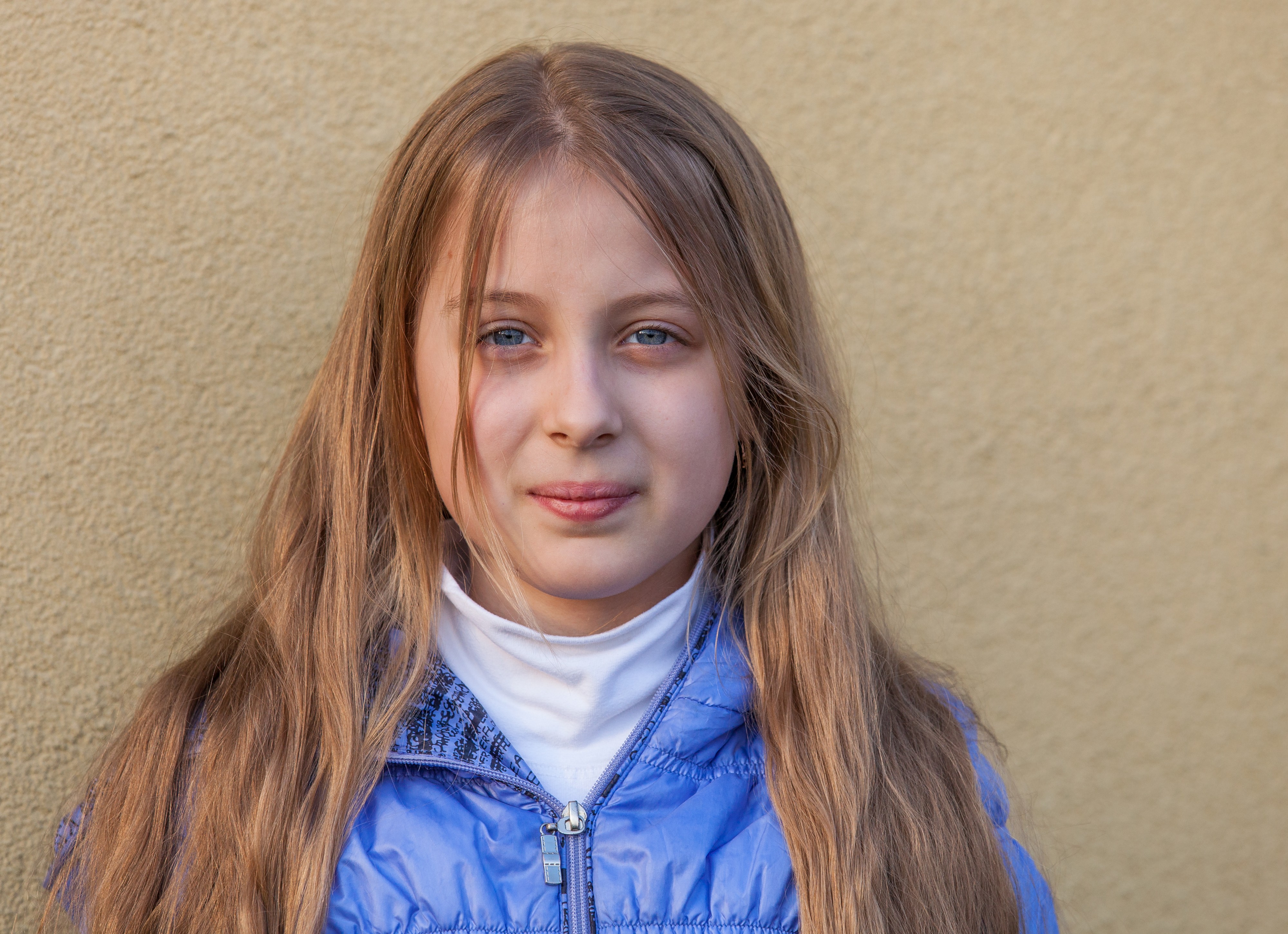 a blond long-haired Roman-Catholic girl photographed in April 2014, portrait 3 out of 11