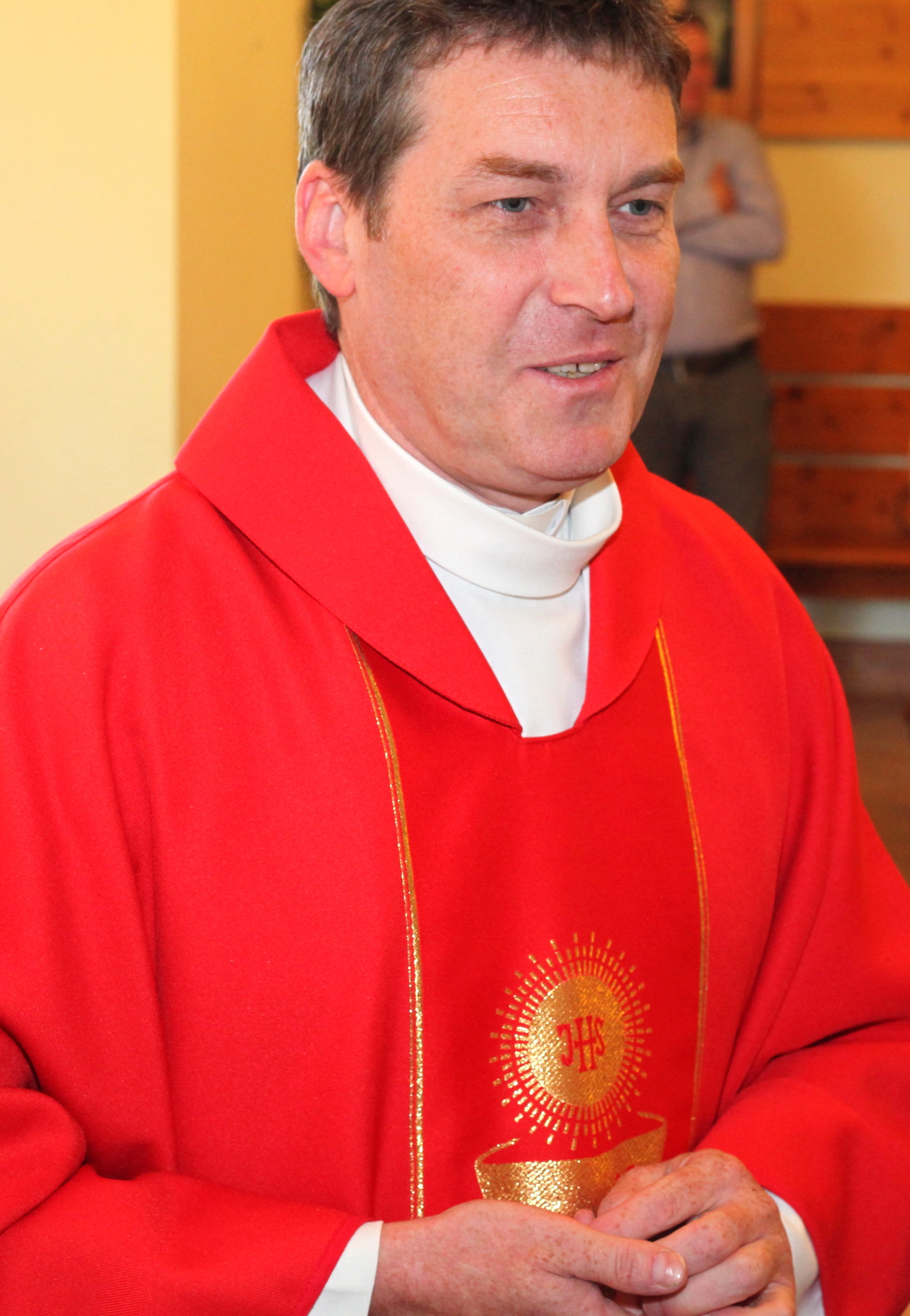 a Catholic priest in a church in May 2013, portrait 2