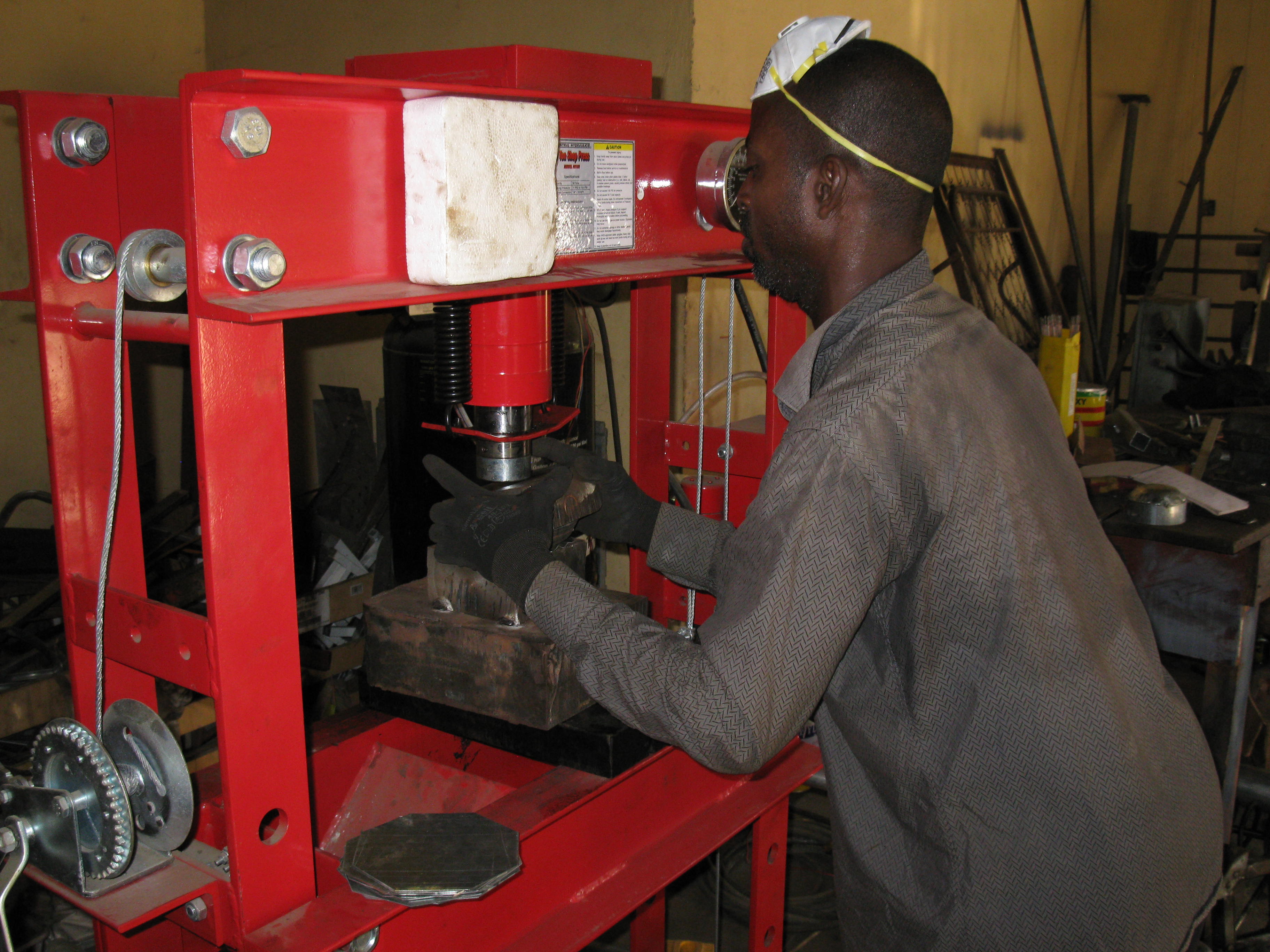 A Ghanaian Metal Fabricator working