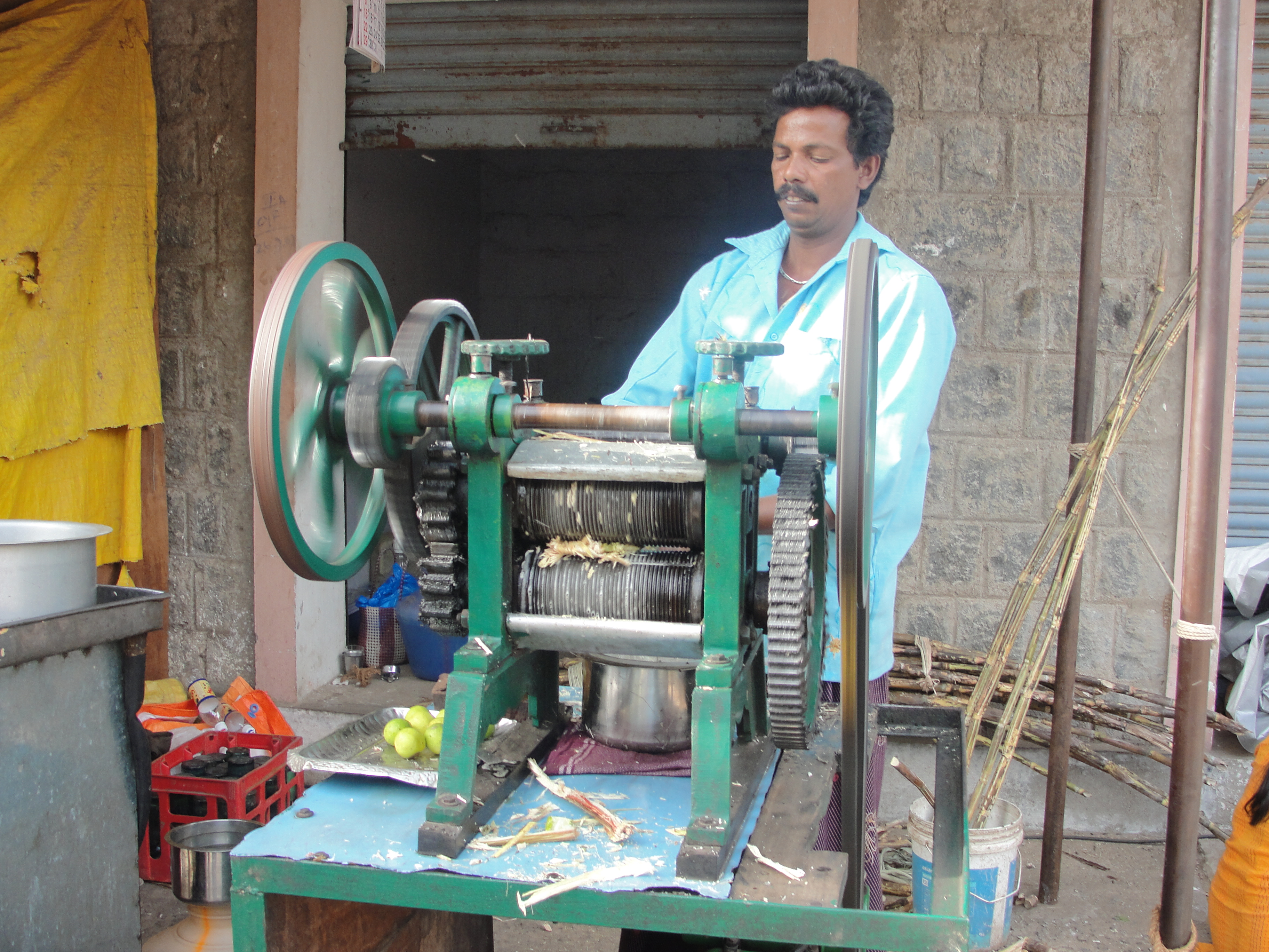 A scene of sugarcane juice extraction