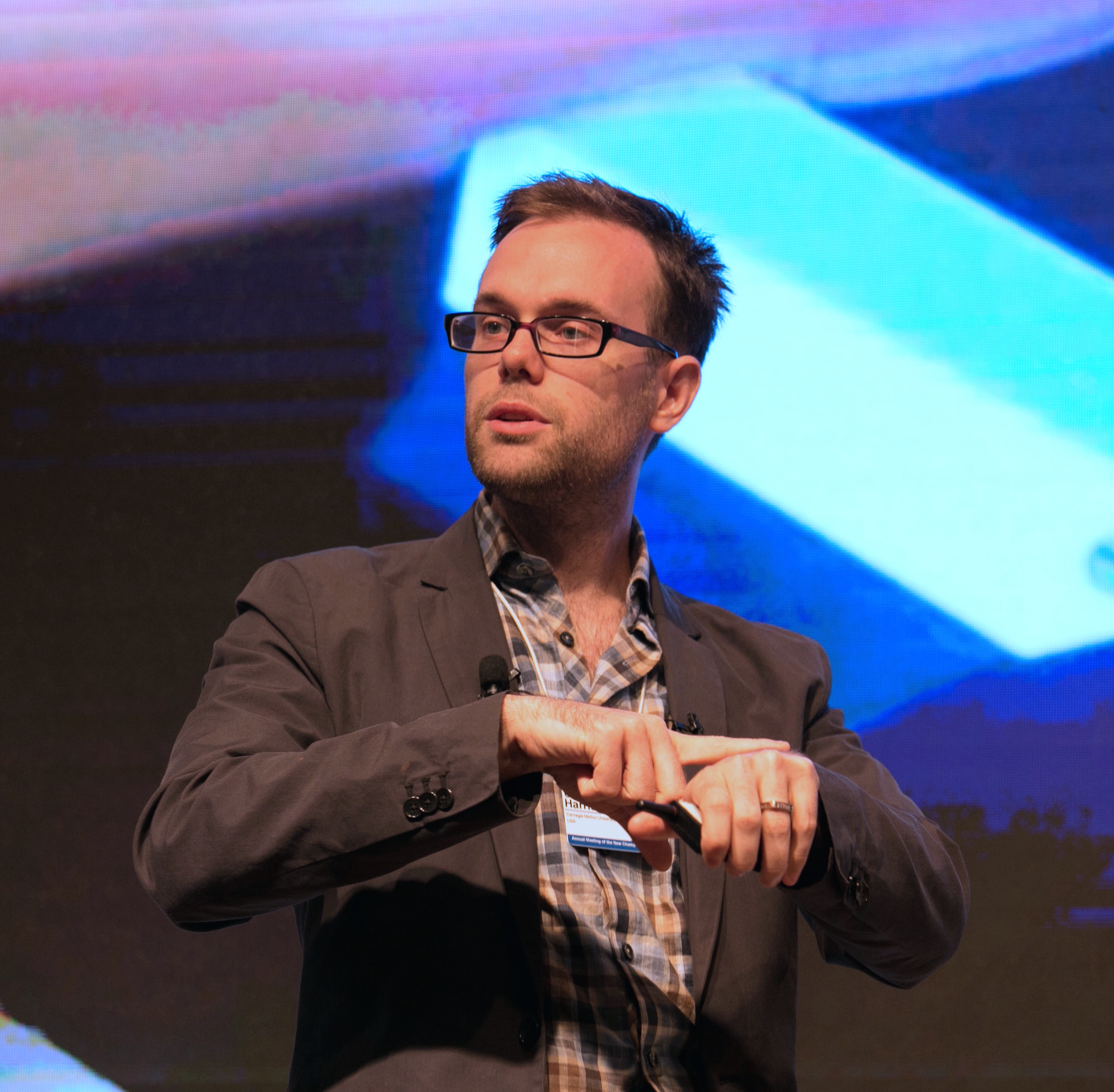 Chris Harrison presenting smartwatches