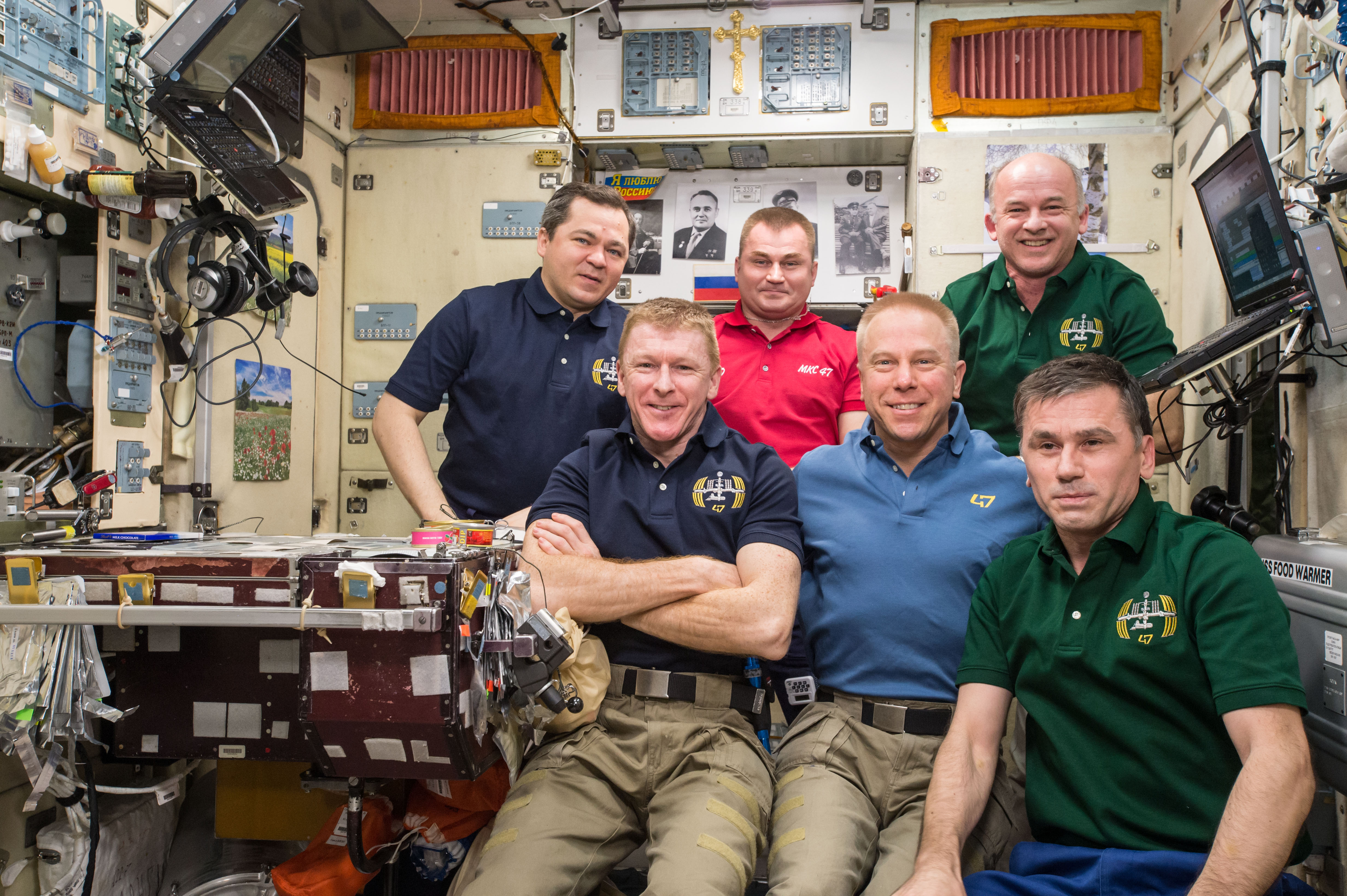 ISS-47 crew poses for the 3 millionth image taken aboard the ISS