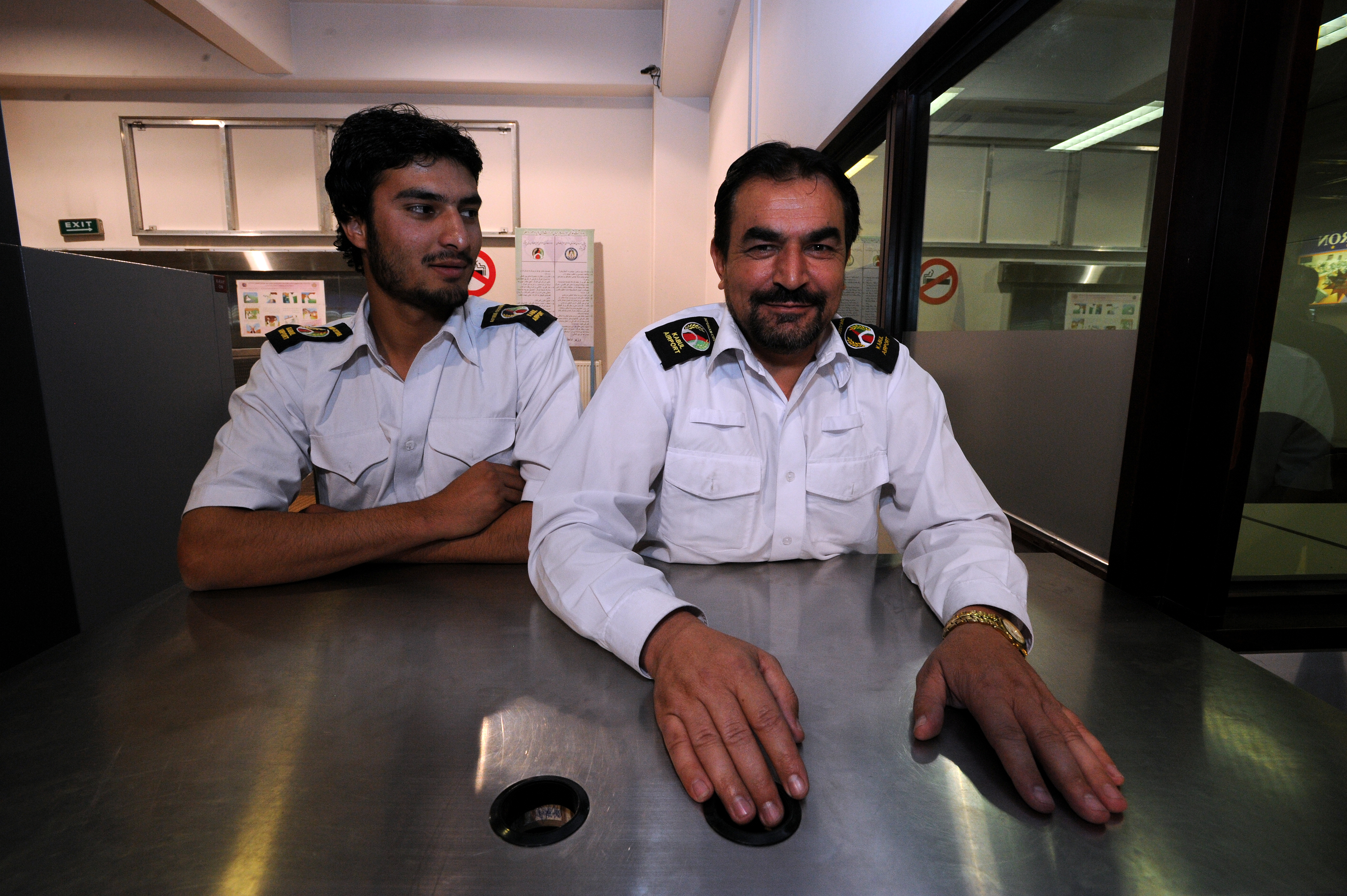 Officials at Kabul International Airport in 2010