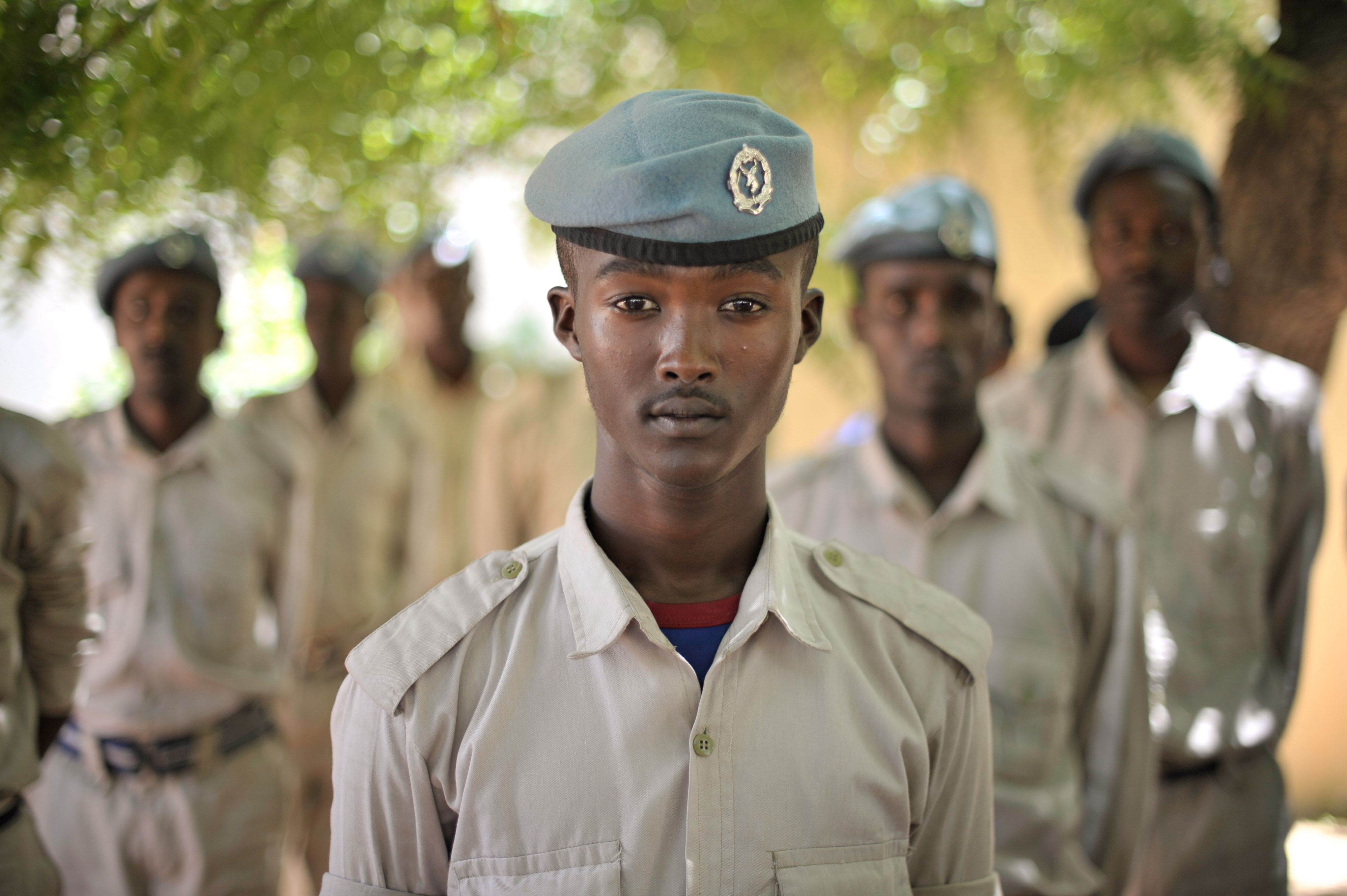 Police officers at General Kahiye Police Academy in Mogadishu, Somalia, watch a training excercise conducted by the African Union on June 16. The African Union is currently training one hundred Somali (14442737225)