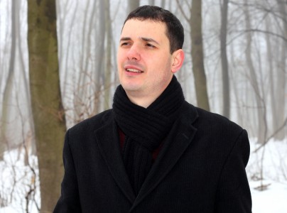 a handsome Catholic man in a forest, picture 2
