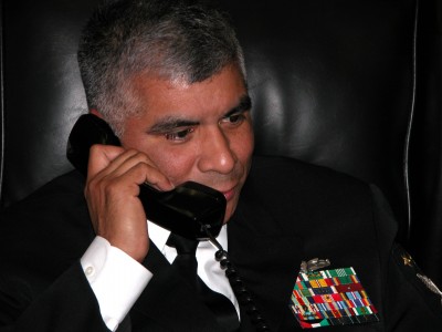 Washington, D.C. (Jan. 18, 2007) - Master Chief Petty Officer of the Navy (MCPON) Joe R. Campa Jr., places a surprise birthday phone call to Master Chief Boiler Technician Jerry Saxton (ret.). Saxton, 80 years old and a resident of Gainesville, Texas, spent 21 years in the Navy from 1944 to 1965. Campa thanked Saxton for his service and told him of his plans to reinvigorate the fleet with heritage and awareness of the Navy's traditions and history. U.S. Navy photo by Senior Chief Mass Communication Specialist Bill Houlihan (RELEASED)