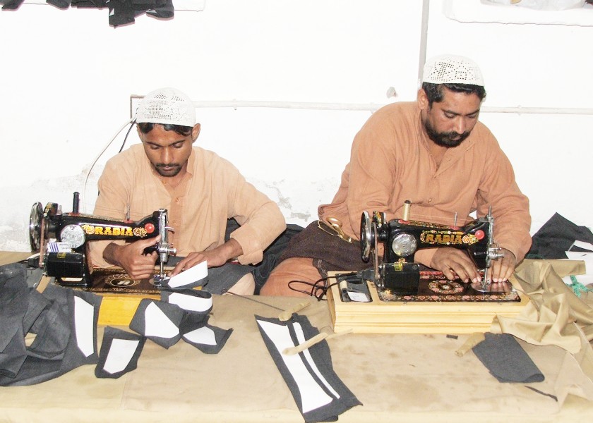 Convicted prisoners learning the art of tailoring and stiching the clothes during confinement in Central Jail Faisalabad, Pakistan in 2010