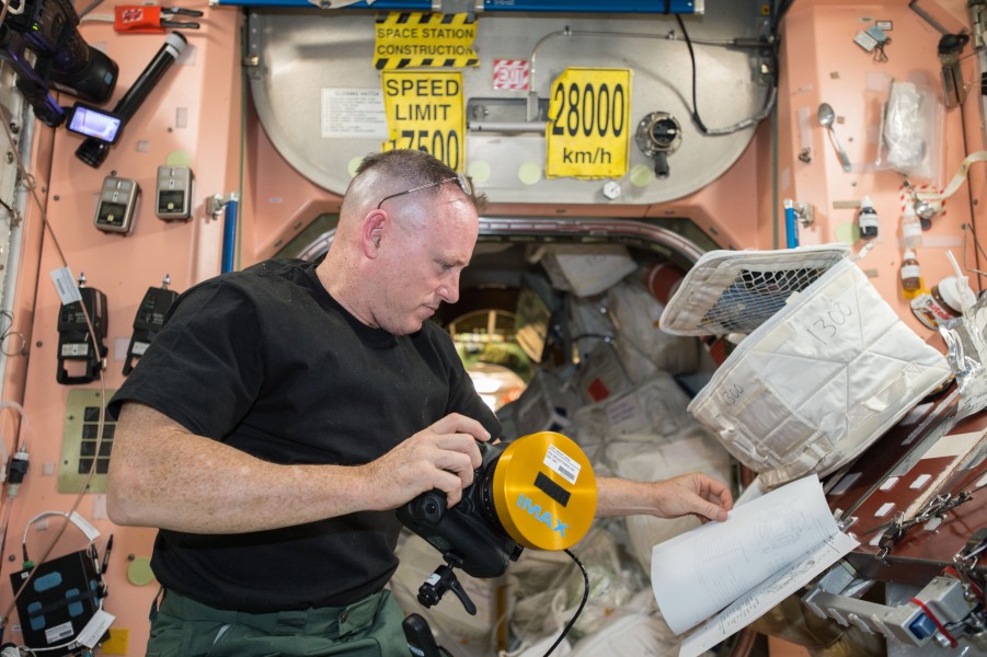 Expedition 41 Wilmore reads about IMAX camera