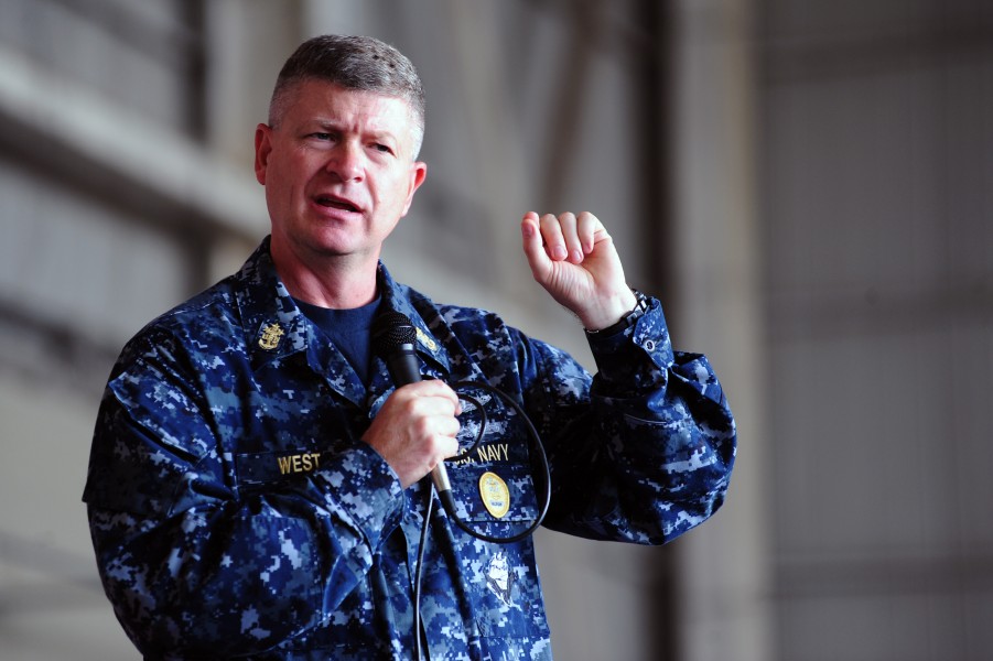 US Navy 101026-N-7526R-214 Master Chief Petty Officer of the Navy (MCPON) Rick D. West answers questions from Sailors during an all-hands call at N