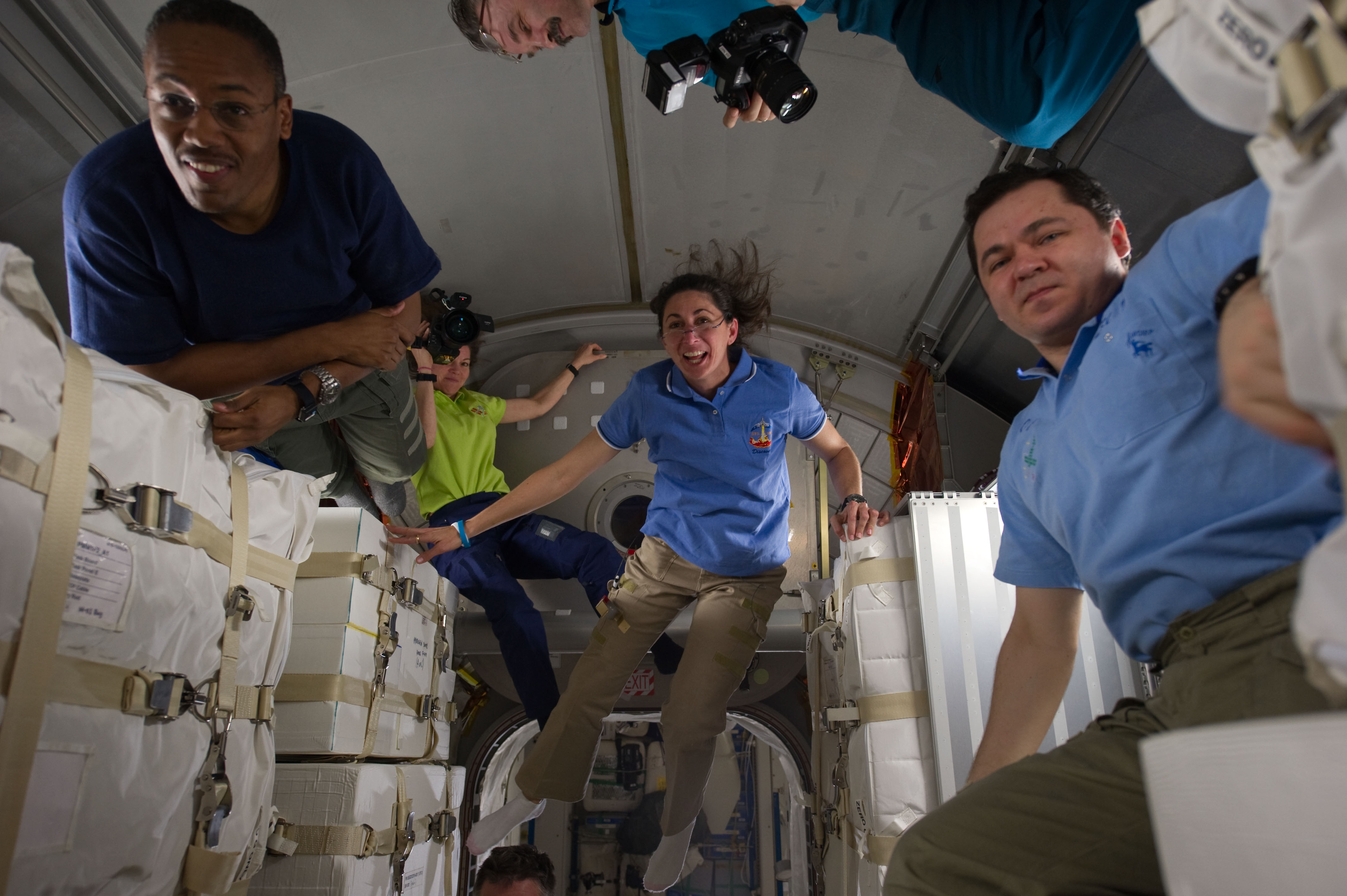 STS-133 ISS-26 crew members in the newly-installed PMM