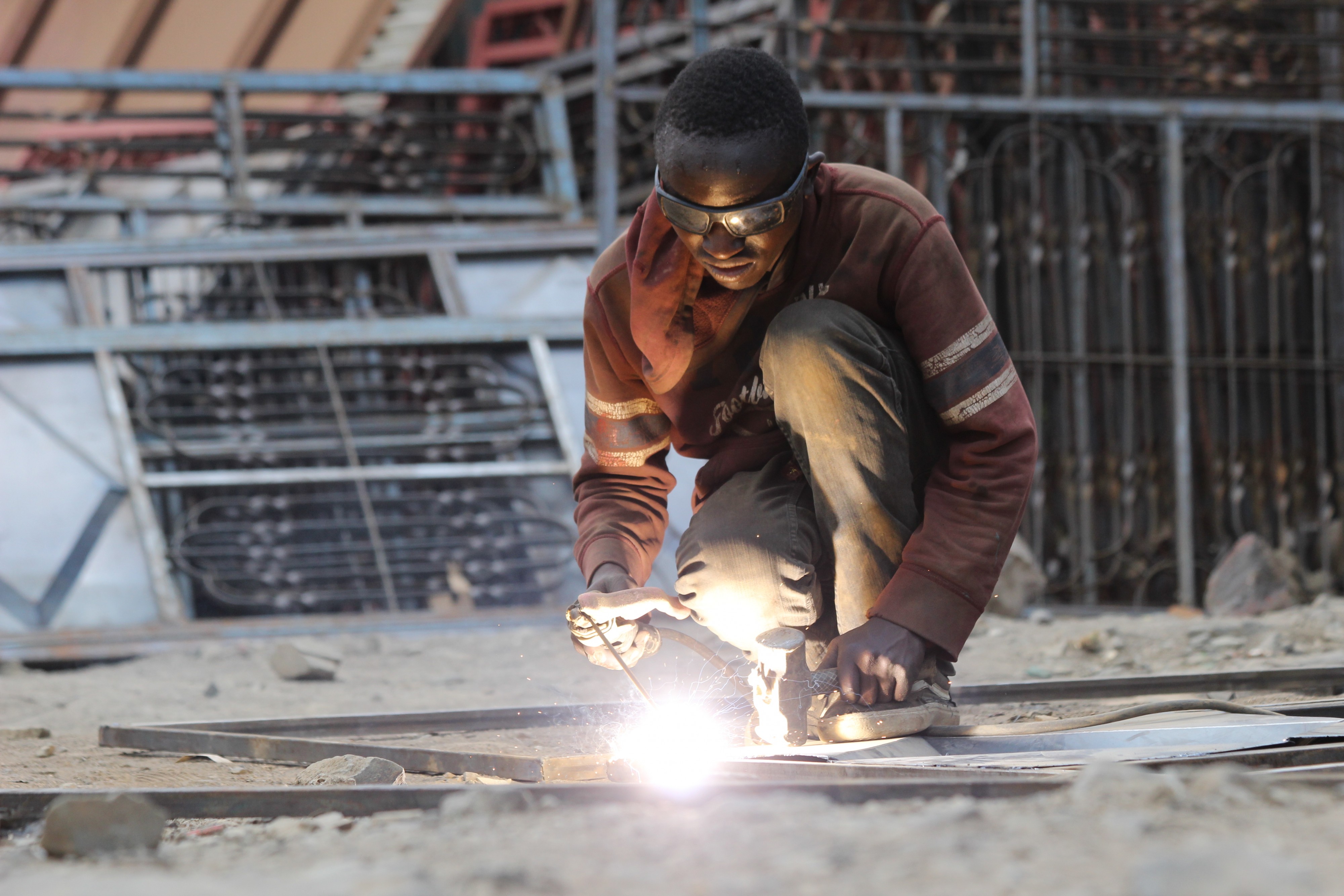 Welding activities by young man